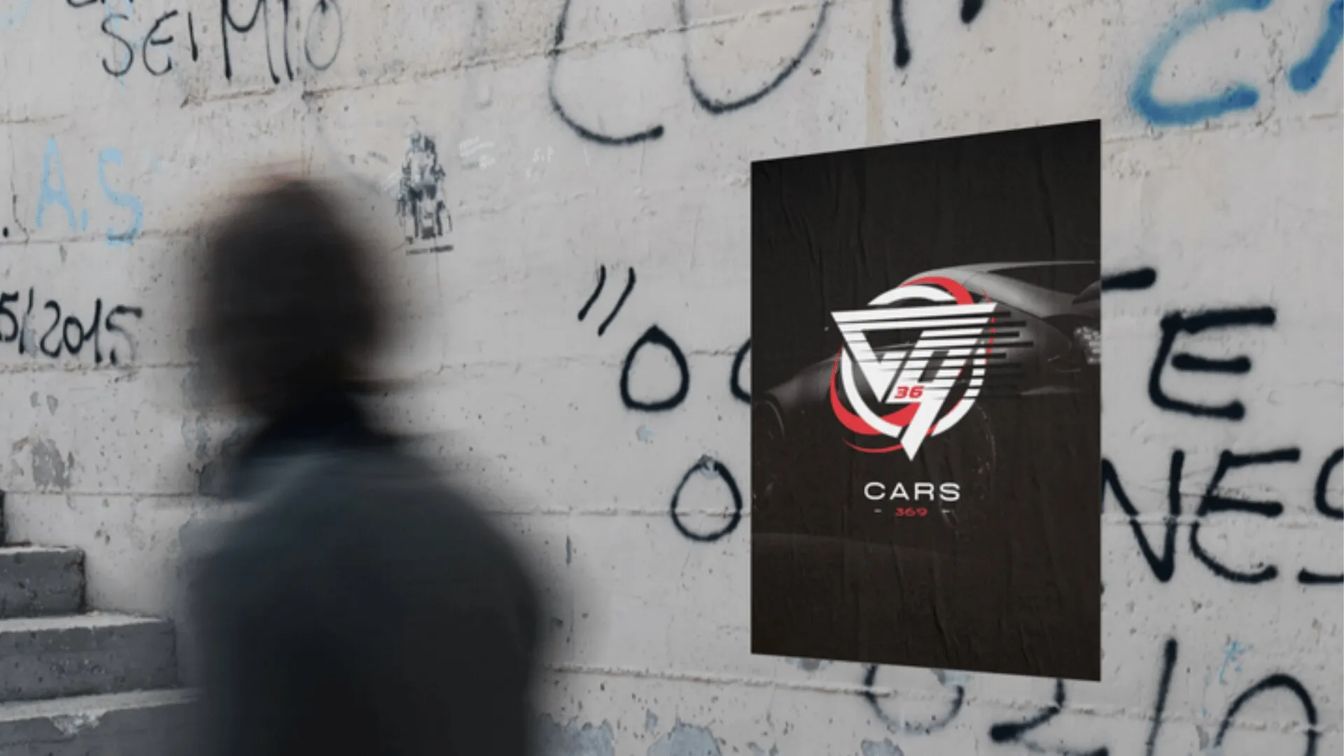 CARS 369 logo painted on a brick wall beside a sports car mural